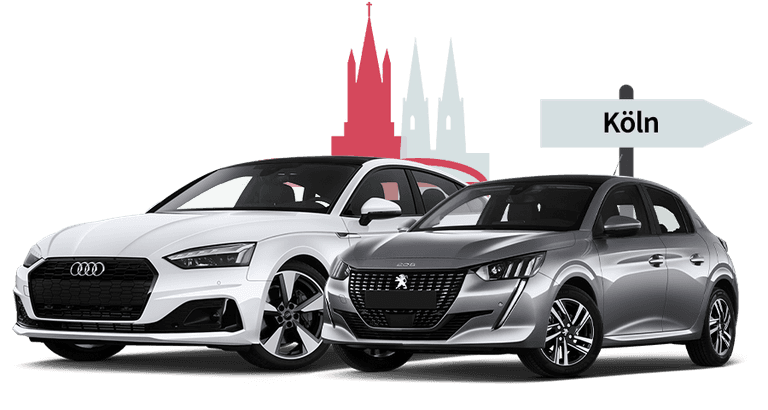 Ein Audi und ein Renault mit einer Köln Skyline Silhouette Ein Audi und ein Renault mit einer Köln Skyline Silhouette